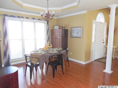 This home has a great open flow with foyer entry open to the large living room and dining room with column detail!