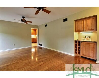Den/Family/Great Room. Bar area in family room fea