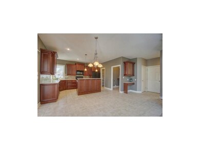 Spacious kitchen with 2 tiered island, walk in pan