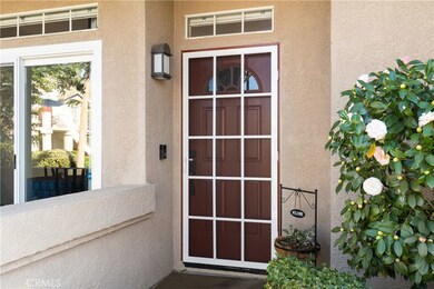 Unlike most condominiums in this price range, this lovely home features so many enhancements and improvements.  Here you can see the new screen door and RING doorbell system.  Also, note the blinds in the upper windows.