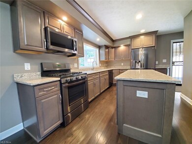 Luxurious kitchen cabinets and granite counter top. Top of the line stainless steel appliances.