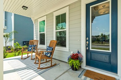 View of patio featuring covered porch