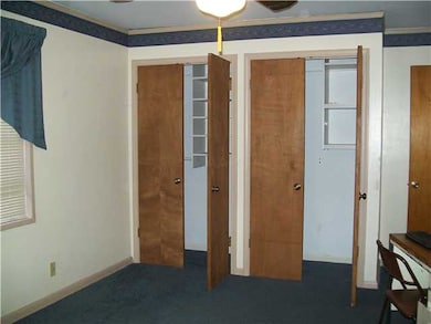 Another bedroom with 2 large closets.