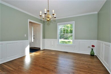 Dining Room with wainscoting and original refinish