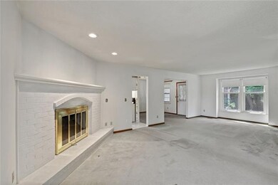 Family room accessing kitchen, dining room and  co