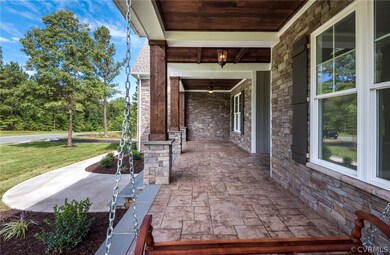 Concrete Stamped Front Porch/Stone at front/Stone