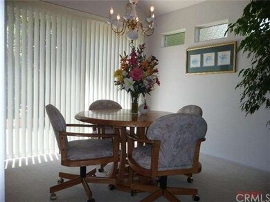 Formal dining area off of the living room and kitc
