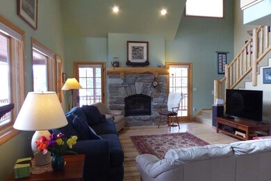 Inviting Great Room With Windows All Around & a Co