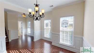 Entry way to formal dining room. Tons of natural l
