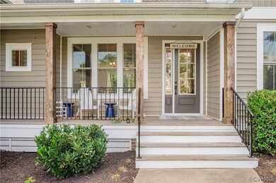 Inviting front porch with wood columns.
