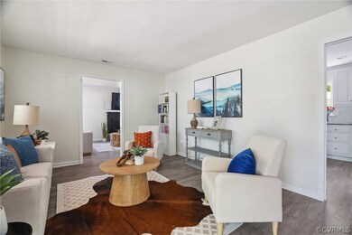 Living room featuring dark hardwood / wood-style f