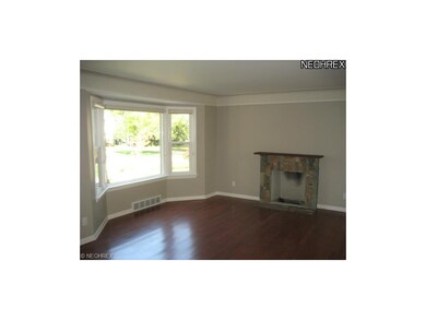 Light and Bright Living Room with Stone Fireplace 