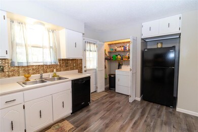 MAIN FLOOR LAUNDRY! Could be converted to large pantry too!