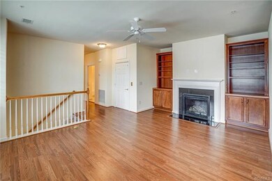 Another living area view.  Stairs go to garage.  D