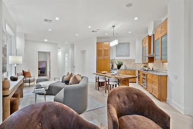 Living area featuring light wood finished floors,