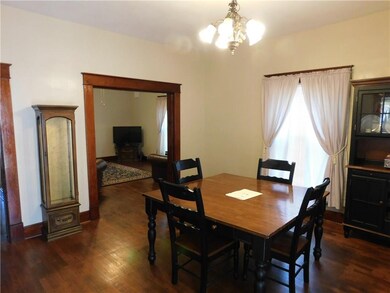 Standing in the dining room looking into the livin