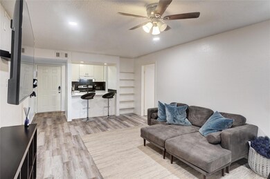 ANOTHER VIEW OF THE LIVING ROOM