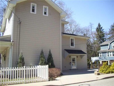 Exterior Front. The siding was put on by the  curr