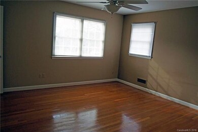 Master Bedroom is upstairs with hardwoods and a ce