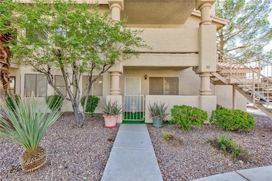 Entrance to property with stucco siding