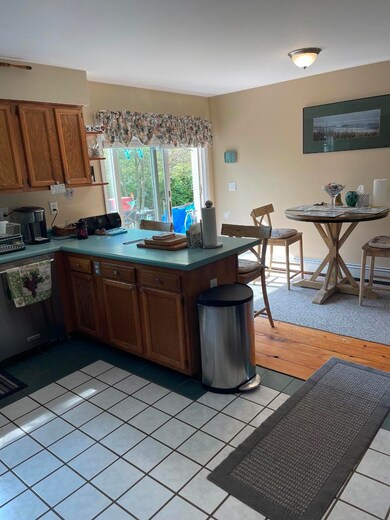 open kitchen with sliders to deck