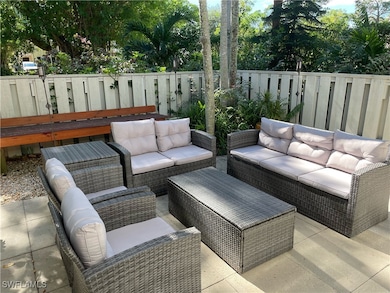 Deck featuring an outdoor hangout area, a fenced b