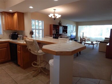 View from Kitchen to Open Concept Living Room and