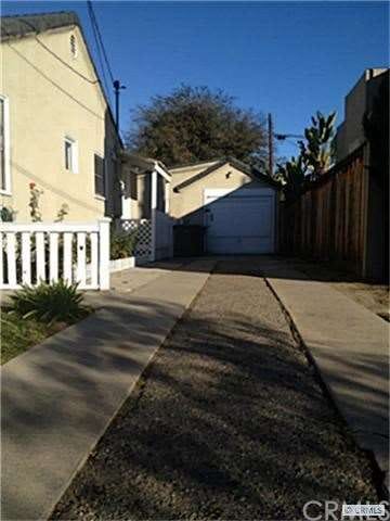 Extended Driveway can fit 3 and possibly 4 cars.