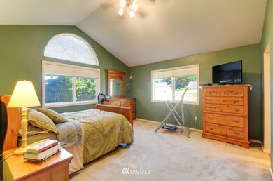 Large master bedroom with walk in closet and master bathroom.