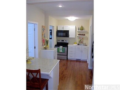 Remodeled kitchen with new cabinets and granite co