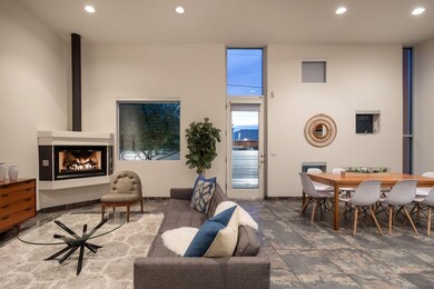 Great room with 14' ceilings & fireplace