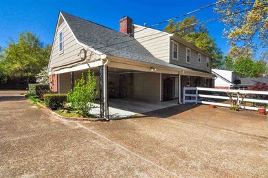 A 2-car carport is located in the back of the home