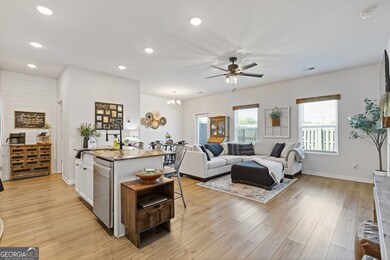 This home shows like a model!  You will love the interior detials they have added with the shiplap wall, beam fireplace matle, matching window details.  This living space is the perfect place to relax.