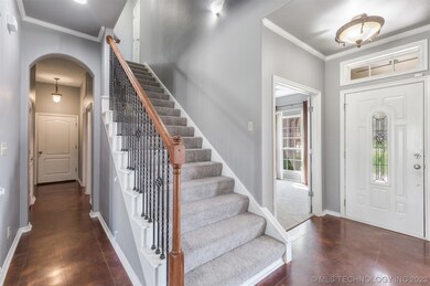 Wide staircase and the hallway that takes you to a