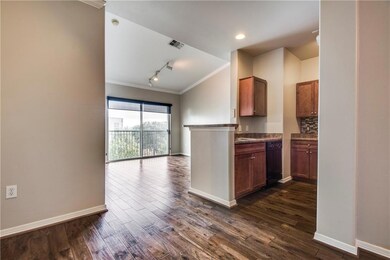 Open floor plan with vaulted ceiling in living are