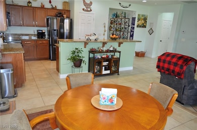 Dining Area Looking Towards Kitchen.  Tile Floorin