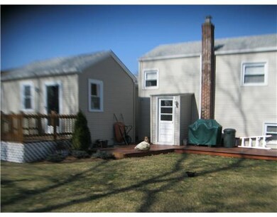 Exterior Back. Private back yard has 2 decks, one