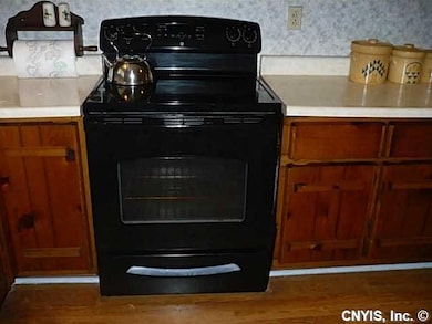 Kitchen. Newer stove.