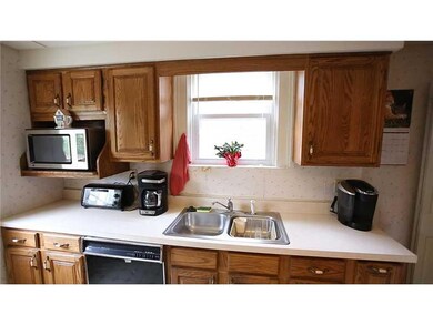 Kitchen. The oak cabinets are in nice shape.