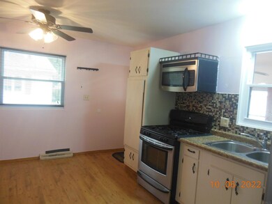 Kitchen to N and back door