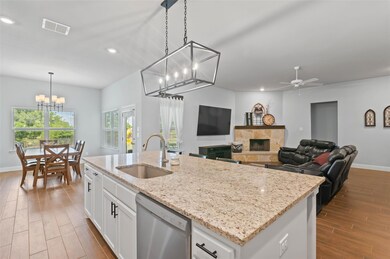 Large kitchen island overlooks open living area