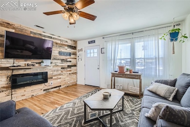 Large front Living Room with gorgeous varied plank