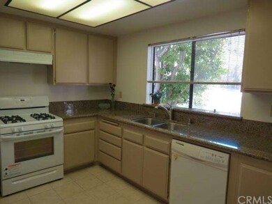 New granite counters and faucet in the kitchen