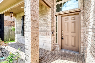 Follow the landscaped pathway to a warm and inviti