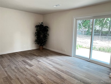 Living Room w/New Flooring - New Patio Door