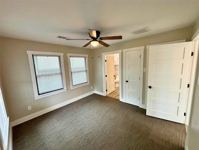 Primary bedroom with connecting bathroom