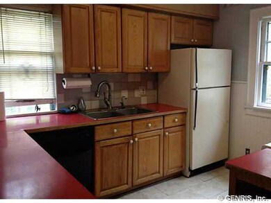 Kitchen. Paint the cabinets white, change the floo