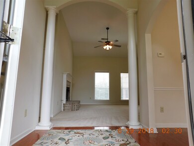 MAJESTIC ENTRY WITH HARDWOOD FLOOR AND ARCHED ENTR