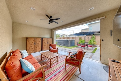 View of patio / terrace with a hot tub, an outdoor