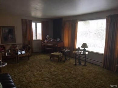 Large living room with a great view out the pictur